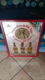 insegna a specchio di grappa 