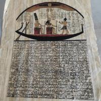 Papiro dipinto a mano con egizi in canoa 