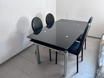 Tavolo vetro temperato nero con 4 sedie nere