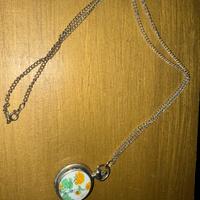 Collana con ciondolo ad orologio