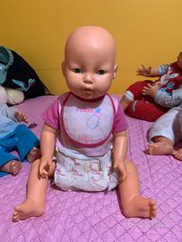 Bambolotto Baby Amore con bavaglino e pannolino