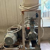 Macchinario per la ricarica di gas inerti