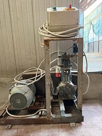 Macchinario per la ricarica di gas inerti