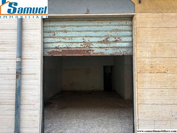 Riposto, bottega (CT)