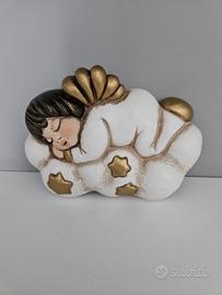 Angelo che dorme su nuvola Thun