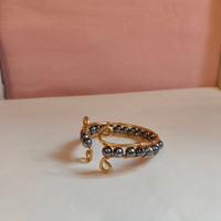 Bracciale regolabile con perle