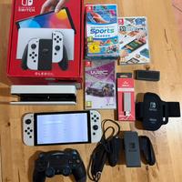 Nintendo Switch Oled piu 3 giochi e accessori