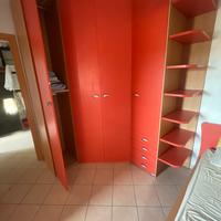 armadio angolare Moretti in legno ciliegio