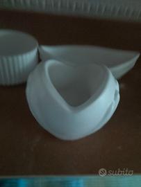 cuore tra le mani in gesso 