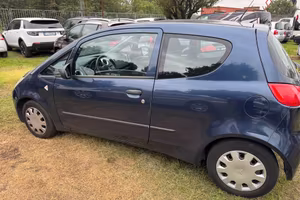 Mitsubishi Colt 1.1 12V 3p. Neoplasie