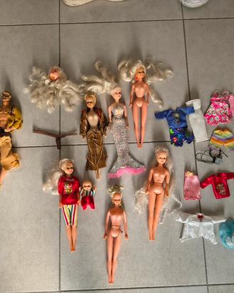 Lotto Ken originale e Barbie clone vari anni