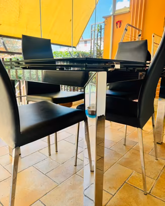 Tavolo calligaris e sedie