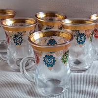 set del caffè in vetro e disegni d'oro