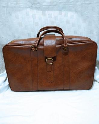 valigia vintage in pelle marrone