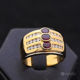 Anello bullow fascia oro 18kt brillanti e rubini