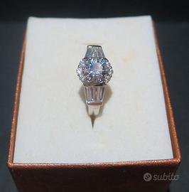 Anello oro bianco e diamanti naturali 