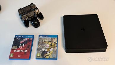 PS4 Slim 1Tb + 2 controller + 7 giochi