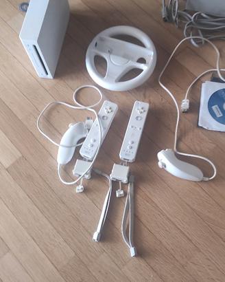 Nintendo Wii + 2 controller+7 giochi