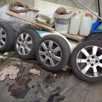 4 cerchi lega opel gommati 185 55 R15 permuto