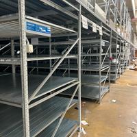 Scaffale a ripiani + soppalco