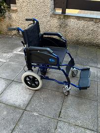 Carrozzina pieghevole da transito