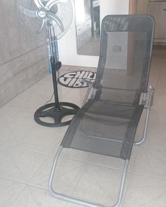 Ventilatore e sdraio mare