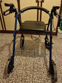 Sedia comoda con rotelle e freni (alluminio forse)