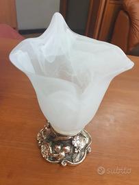 Oggetto in vetro lavorato con base argentata