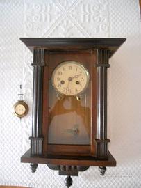 orologio a pendolo da parete