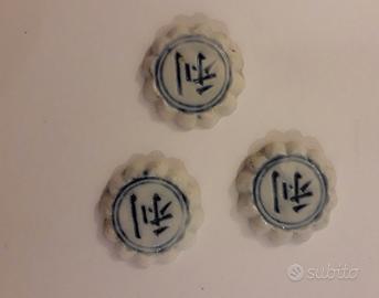 Numismatica monete in porcellana