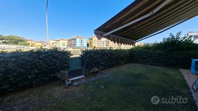 Appartamento con giardino e garage