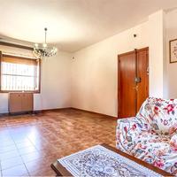 Trilocale con giardino e taverna