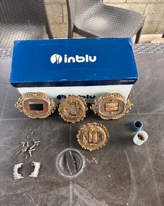 Placchette complete di bottini in bronzo