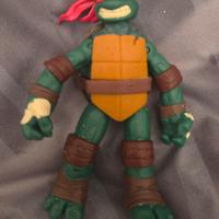 tartaruga ninja Raffaello - completa di armi