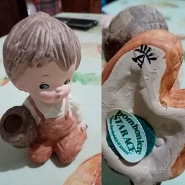 Bambino con cesto 