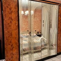 Camera in radica di noce