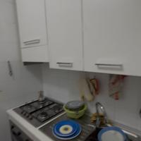 cucina con camera da letto bambino