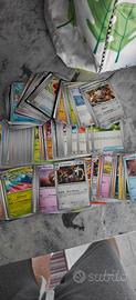 Carte Pokemon varie e valigetta metallo