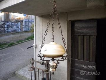 Antico lampadari con ceramica