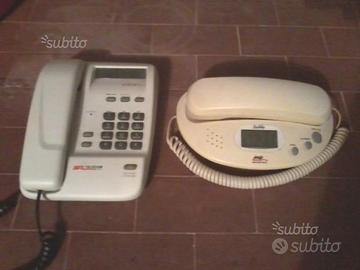 Telefoni Telecom e dgt con orologio e sveglia