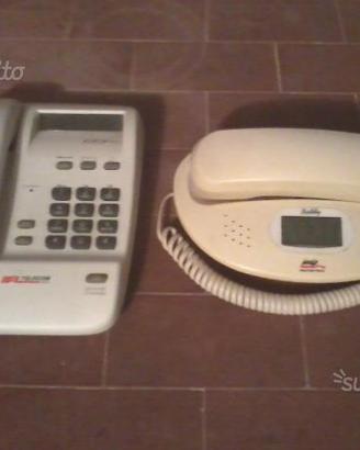 Telefoni Telecom e dgt con orologio e sveglia