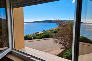 Fertilia ampio appartamento vista mare