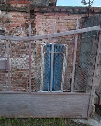 Portone doppia anta in ferro battuto
