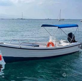 barca lancione 5.50 mt con motore fuoribordo 