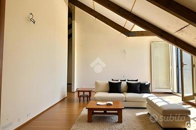 MANSARDA A GIUGLIANO IN CAMPANIA