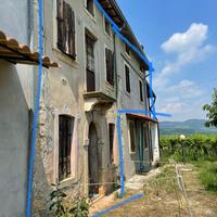 Porzione di casale con quota di terreno/vigneto