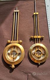 orologio pendolo bilancieri