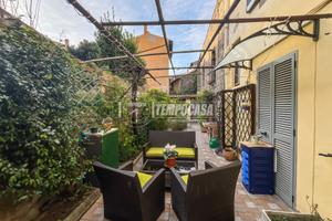APPARTAMENTO CON GIARDINO PAVIMENTATO AL CENTRO ST