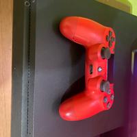 PS4 con giochi e controller