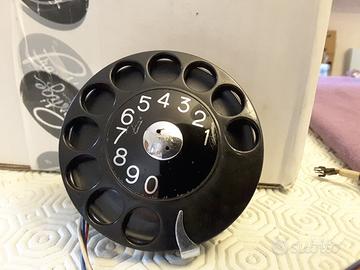Disco combinatore telefonico